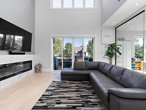 1303 Clement Court, Edmonton, AB - Indoor Photo Showing Living Room With Fireplace