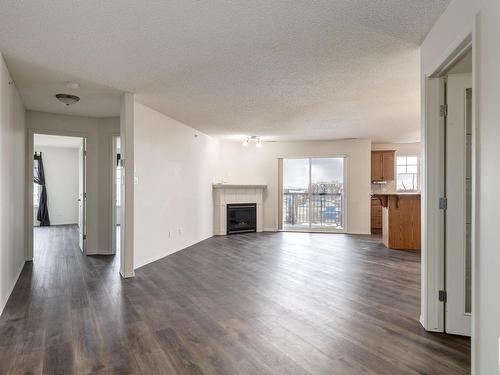 419 2098 Blackmud Creek Drive, Edmonton, AB - Indoor Photo Showing Living Room With Fireplace