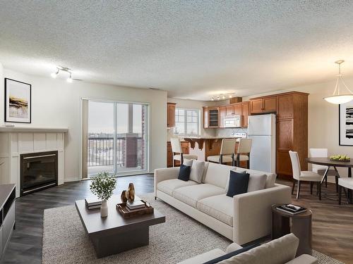 419 2098 Blackmud Creek Drive, Edmonton, AB - Indoor Photo Showing Living Room With Fireplace