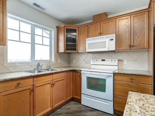 419 2098 Blackmud Creek Drive, Edmonton, AB - Indoor Photo Showing Kitchen With Double Sink