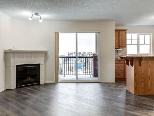 419 2098 Blackmud Creek Drive, Edmonton, AB - Indoor Photo Showing Living Room With Fireplace