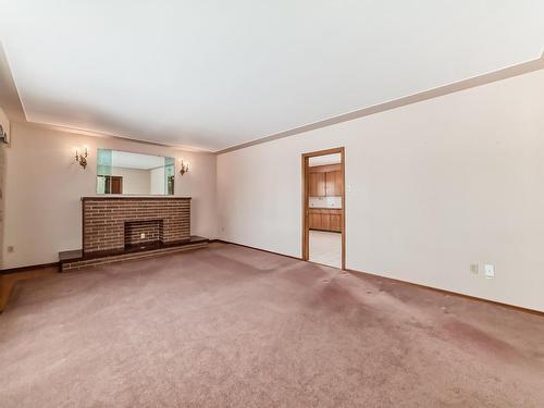 12904 95A Street, Edmonton, AB - Indoor Photo Showing Other Room With Fireplace