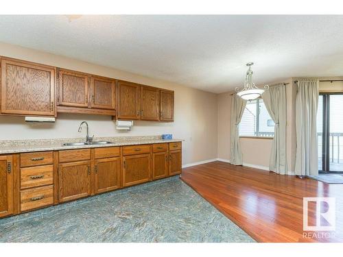 10672 153 Avenue, Edmonton, AB - Indoor Photo Showing Kitchen With Double Sink