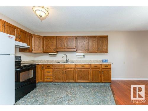 10672 153 Avenue, Edmonton, AB - Indoor Photo Showing Kitchen With Double Sink