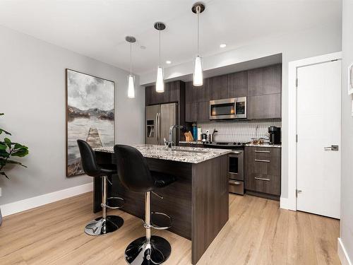 1404 11969 Jasper Avenue, Edmonton, AB - Indoor Photo Showing Kitchen With Upgraded Kitchen