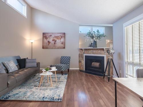 14167 26 Street, Edmonton, AB - Indoor Photo Showing Living Room With Fireplace