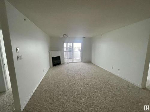 451 2096 Blackmud Creek Drive, Edmonton, AB - Indoor Photo Showing Other Room With Fireplace