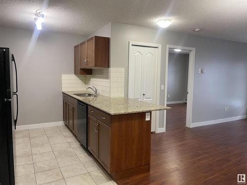 Edmonton, AB - Indoor Photo Showing Kitchen