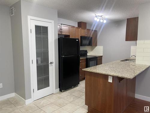 Edmonton, AB - Indoor Photo Showing Kitchen