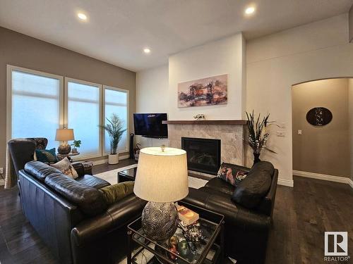 1318 Hainstock Way Sw, Edmonton, AB - Indoor Photo Showing Living Room With Fireplace