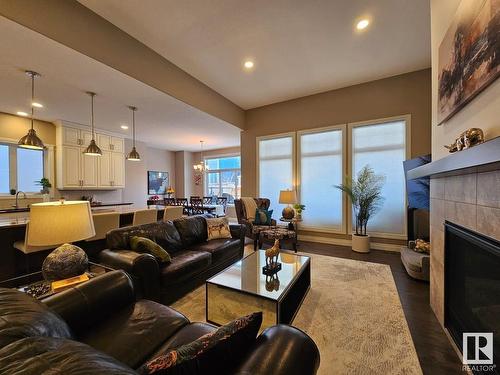 1318 Hainstock Way Sw, Edmonton, AB - Indoor Photo Showing Living Room With Fireplace