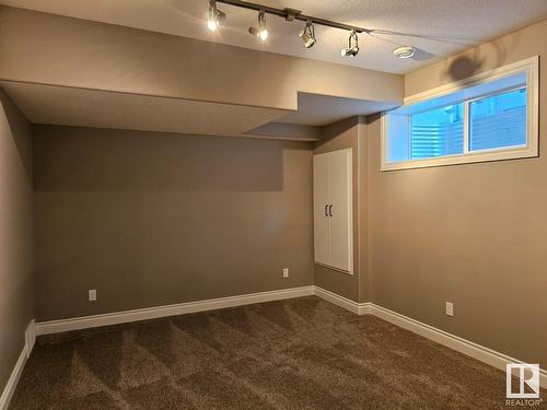 1318 Hainstock Way Sw, Edmonton, AB - Indoor Photo Showing Other Room