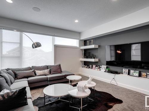 607 Howatt Drive Sw, Edmonton, AB - Indoor Photo Showing Living Room