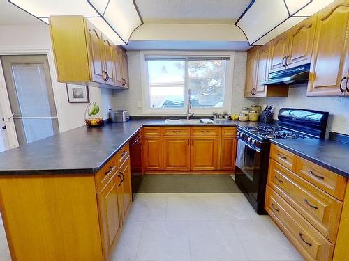 37 Alpine Boulevard, St. Albert, AB - Indoor Photo Showing Kitchen With Double Sink