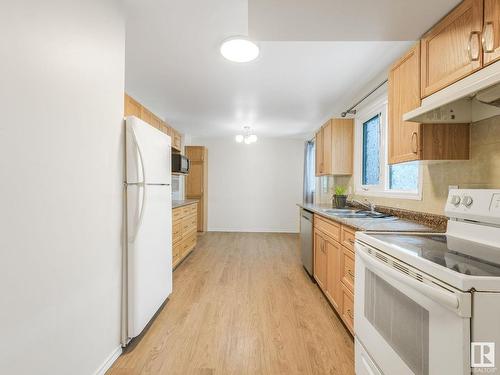 10312 Lauder Avenue, Edmonton, AB - Indoor Photo Showing Kitchen With Double Sink