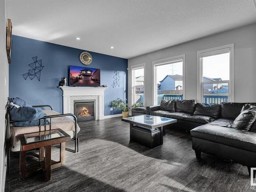 1451 29 St, Edmonton, AB - Indoor Photo Showing Living Room With Fireplace