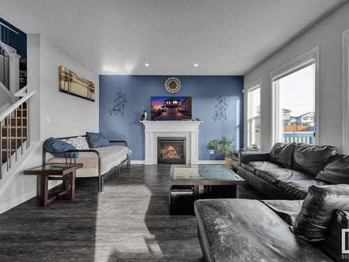 1451 29 St, Edmonton, AB - Indoor Photo Showing Living Room With Fireplace