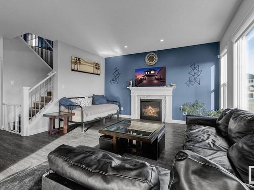 1451 29 St, Edmonton, AB - Indoor Photo Showing Living Room With Fireplace