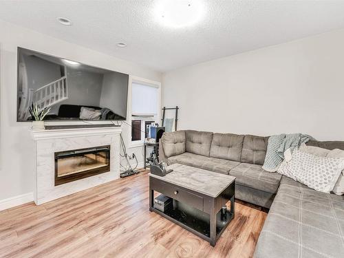 16725 18 Avenue, Edmonton, AB - Indoor Photo Showing Living Room With Fireplace