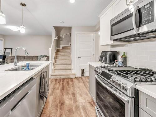 16725 18 Avenue, Edmonton, AB - Indoor Photo Showing Kitchen With Double Sink With Upgraded Kitchen