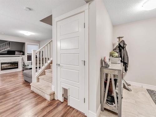 16725 18 Avenue, Edmonton, AB - Indoor Photo Showing Other Room With Fireplace