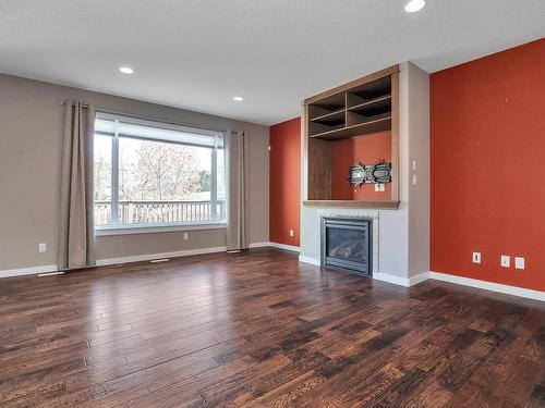 10611 130 Street, Edmonton, AB - Indoor Photo Showing Living Room With Fireplace