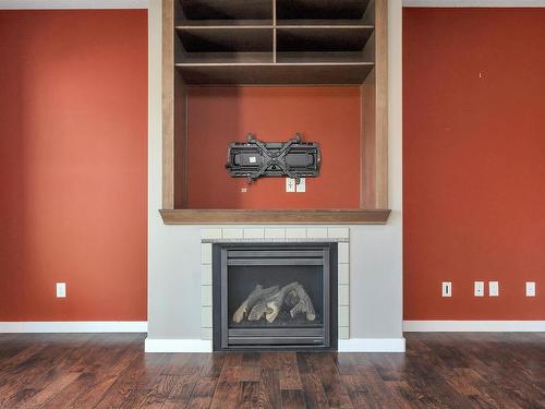 10611 130 Street, Edmonton, AB - Indoor Photo Showing Living Room With Fireplace