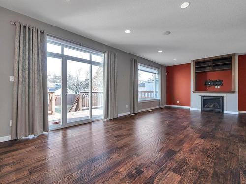 10611 130 Street, Edmonton, AB - Indoor Photo Showing Living Room With Fireplace