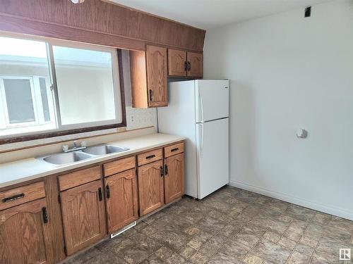 12245 86 Street, Edmonton, AB - Indoor Photo Showing Kitchen With Double Sink