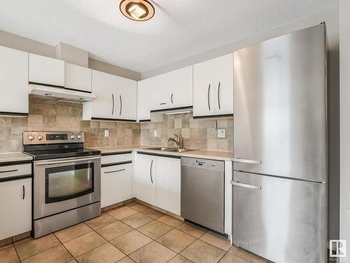 30 9520 174 Street, Edmonton, AB - Indoor Photo Showing Kitchen With Double Sink