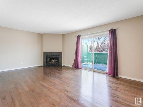 30 9520 174 Street, Edmonton, AB - Indoor Photo Showing Living Room With Fireplace