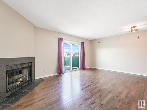 30 9520 174 Street, Edmonton, AB - Indoor Photo Showing Living Room With Fireplace