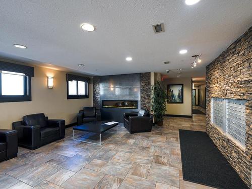 105 9707 106 Street, Edmonton, AB - Indoor With Fireplace