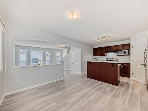 Edmonton, AB - Indoor Photo Showing Kitchen