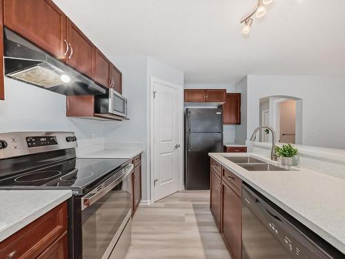 Edmonton, AB - Indoor Photo Showing Kitchen With Double Sink