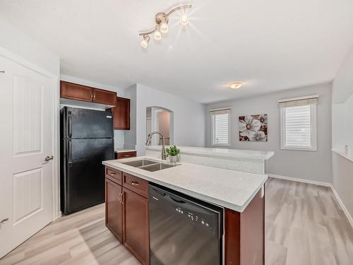 Edmonton, AB - Indoor Photo Showing Kitchen With Double Sink