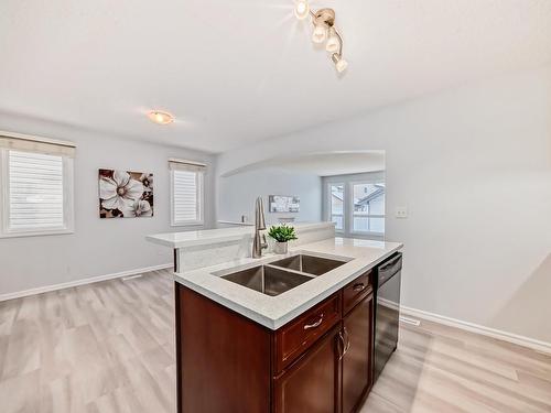 Edmonton, AB - Indoor Photo Showing Kitchen With Double Sink