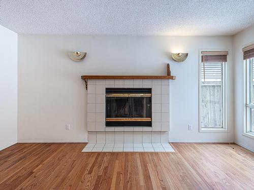 232 Ockenden Place, Edmonton, AB - Indoor Photo Showing Living Room With Fireplace