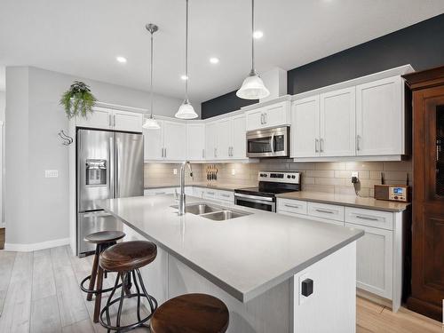 9741 70 Avenue, Edmonton, AB - Indoor Photo Showing Kitchen With Double Sink With Upgraded Kitchen