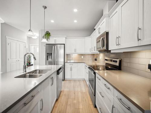 9741 70 Avenue, Edmonton, AB - Indoor Photo Showing Kitchen With Double Sink With Upgraded Kitchen