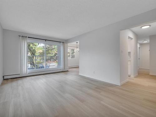 222 5730 Riverbend Road, Edmonton, AB - Indoor Photo Showing Living Room