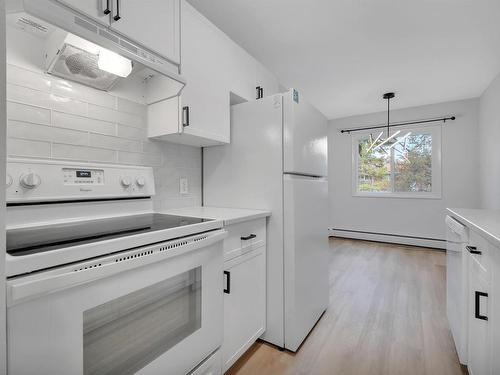 222 5730 Riverbend Road, Edmonton, AB - Indoor Photo Showing Kitchen