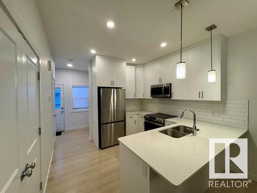 3843 Chrustawka Place, Edmonton, AB - Indoor Photo Showing Kitchen With Double Sink With Upgraded Kitchen