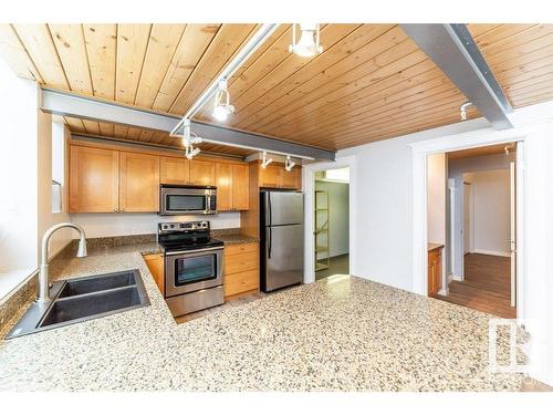 208 10009 102 Avenue, Edmonton, AB - Indoor Photo Showing Kitchen With Stainless Steel Kitchen With Double Sink