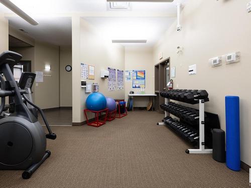 127 160 Magrath Road, Edmonton, AB - Indoor Photo Showing Gym Room