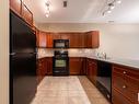 127 160 Magrath Road, Edmonton, AB  - Indoor Photo Showing Kitchen With Double Sink 