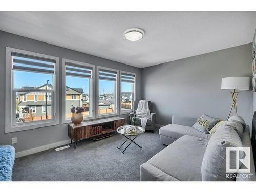 3971 5 Avenue, Edmonton, AB - Indoor Photo Showing Living Room