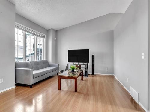 8307 170 Avenue, Edmonton, AB - Indoor Photo Showing Living Room