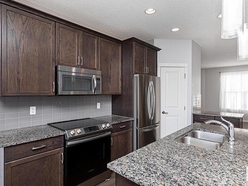 17715 59 Street, Edmonton, AB - Indoor Photo Showing Kitchen With Double Sink With Upgraded Kitchen