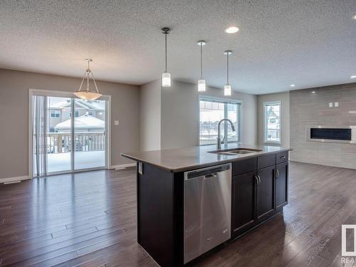 3520 Claxton Crescent, Edmonton, AB - Indoor Photo Showing Kitchen With Fireplace With Upgraded Kitchen